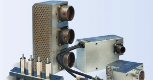 Close-up of vintage electronic equipment with lenses and connectors.