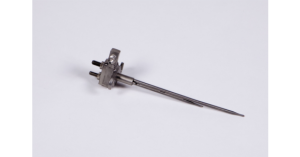 A stainless steel industrial probe with mounting hardware.