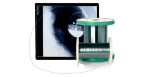 Spools of fine wire and a display showing a magnified section of the wire.