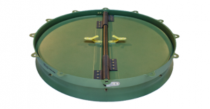 Green circular mechanical device with metal components and clamps.